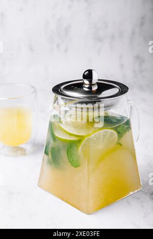 Iced green tea with lime and fresh mint Stock Photo