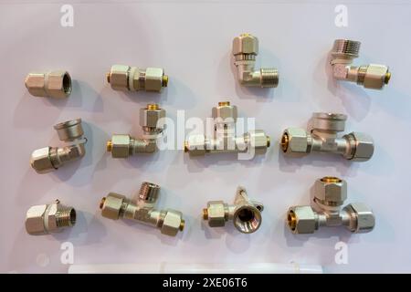Crimping fitting system for plastic pipes Stock Photo