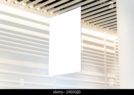 Blank advertising billboard hanging in the supermarket. Blank White Supermarket Banners Hanging From Ceiling. Hangers Mockup Ready For Branding Or Adv Stock Photo