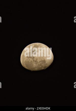 Waning crescent moon phase on a clear sky, southern hemisphere, Mahe Seychelles. Stock Photo