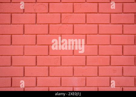Background from a painted red stone wall Stock Photo