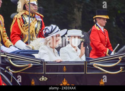 London, UK. 25th June 2024. QUEEN CAMILLA and EMPRESS MASAKO ride in a royal carriage on The Mall towards Buckingham Palace as Emperor Naruhito and Empress Masako of Japan begin their three-day state visit to the UK. Credit: Vuk Valcic/Alamy Live News Stock Photo