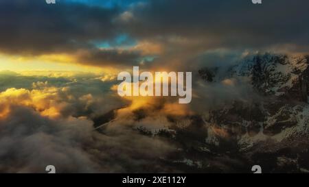 Rocky mountains at sunset aerial Stock Photo