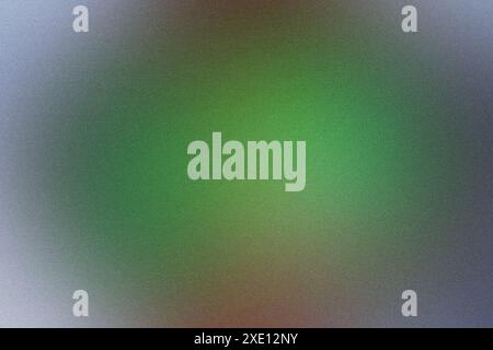 Grainy textured background featuring a smooth gradient transitioning from blue to green and brown Stock Photo