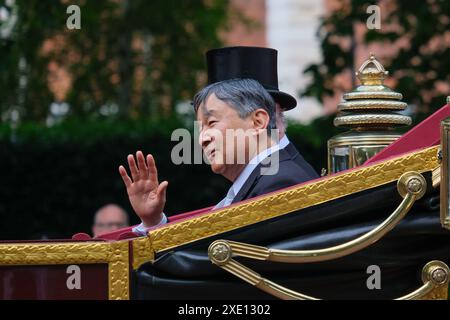 London, UK, 25th June, 2024. King Charles III and Emperor Naruhito ride together in a carriage procession on the Mall to Buckingham Palace, following a welcome ceremony in Horse Guards Parade on the first of a three-day state visit by the Emperor and Empress of Japan. Credit: Eleventh Hour Photography/Alamy Live News Stock Photo