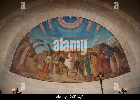 Painting above the apse in the Church of Bethphage on Mt. of Olives showing Jesus Christ riding a colt on the way to the Temple Mt. in Jerusalem Stock Photo