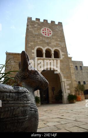 Colt like flower pot by the Catholic Church of Bethphage on Mt. of Olives, Jerusalem Cross on the tower, Christ started ride on colt to Temple here. Stock Photo