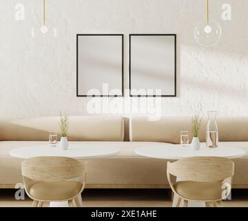 Two empty poster frames above light beige sofa in cafe with round coffee tables and chairs, 3d rendering Stock Photo