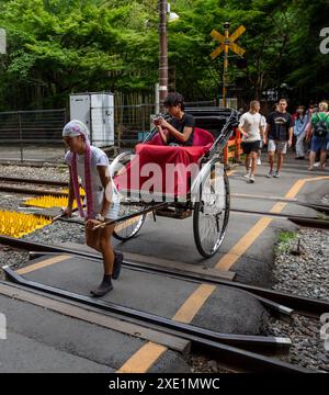Japanese rickshaw (jinrikisha) in arashiyama street, Japan Stock Photo ...