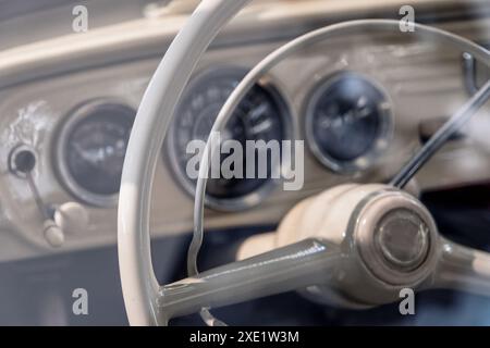 Steering wheel and dashboard of old car Stock Photo