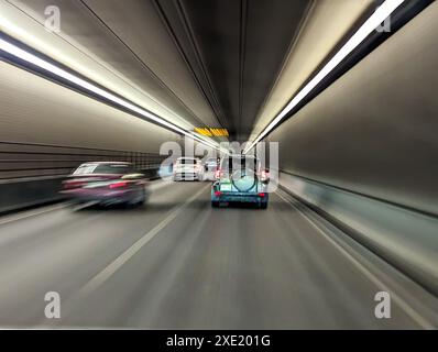 Driving through highway tunnel abstract view Stock Photo