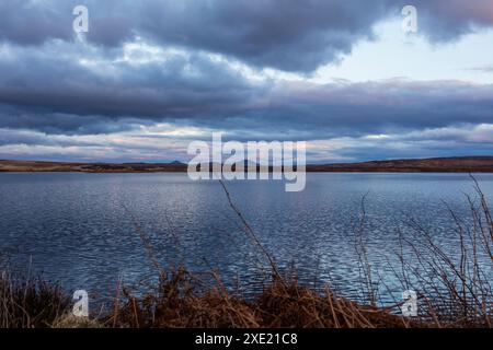 Highlands, Scotland. Loch Loyal in the evening. Loch Loyal is a freshwater lake located in the traditional county of Sutherland, between Tongue and Al Stock Photo