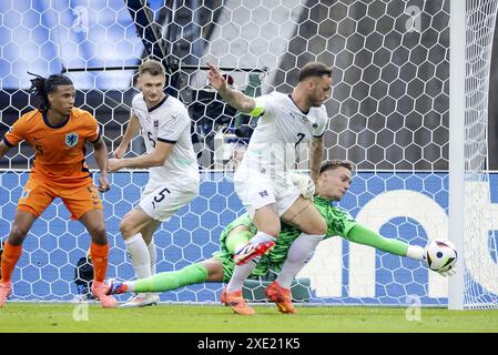 Berlin, Germany June 25, 2024.  Holland goalkeeper Bart Verbruggen saves an Austrian effort during the UEFA EURO 2024 group D match between the Netherlands and Austria at the Olympiastadion on June 25, 2024 in Berlin, Germany. ANP KOEN VAN WEEL/Alamy Live News/Alamy Live News Stock Photo