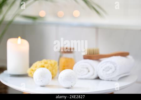 Bathroom with tropical plants bath rolled towels Stock Photo