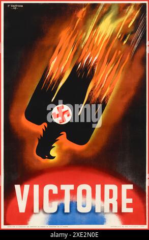 1944 French WW2 Propaganda Poster featuring the German Eagle and Swastika in flames hurtling to doom. The end to Nazi Germany occupation of France and their World War II defeat 1944 Titled VICTOIRE Victory. Artist P Baudouin France Stock Photo