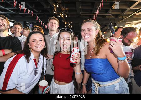 London, UK. 25th June, 2024. England fans watch England v Slovenia at 4TheFans Dalston, a fan venue screening the match at Dalston Roofpark in London.Credit: Imageplotter/Alamy Live News Stock Photo