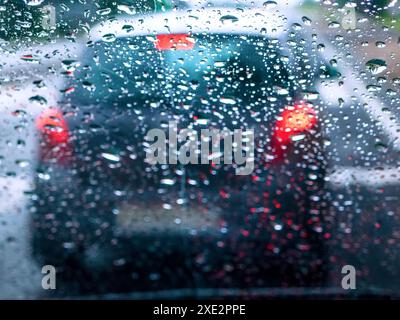 Raindrops on the windshield of a car Stock Photo