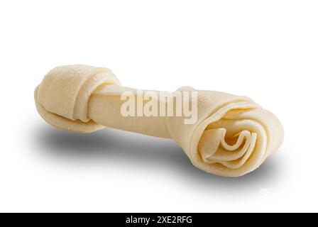Artificial bone for dog chewing isolated on white background. Stock Photo