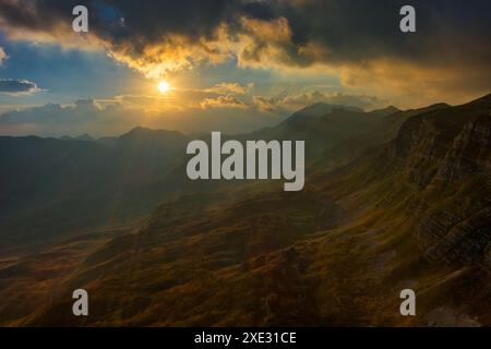 Spectacular sunset on mountain valley Stock Photo