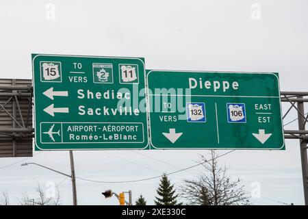 Highway signs to Dieppe, Shediac and Sackville on Main Street in downtown Moncton, New Brunswick, Canada Stock Photo