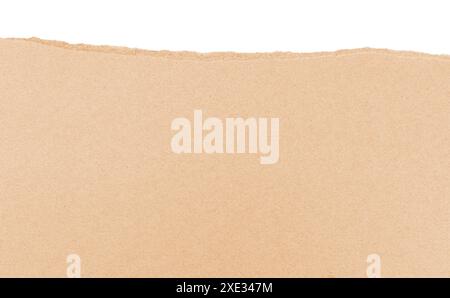 Sheet of Brown Cardboard Paper Half Torn Stock Photo