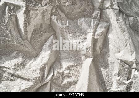 Abstract background from frozen silver foil in frost. High quality photo Stock Photo