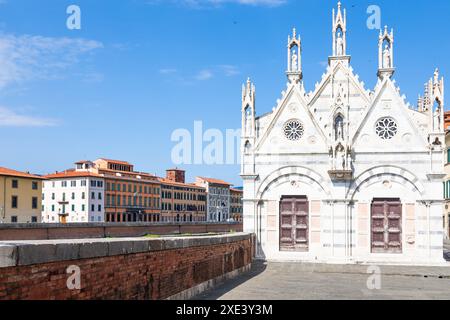 Pisa, Italy - colourful buildings on Arno river. Urban skyline, travel destination. Stock Photo