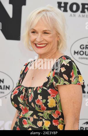 LOS ANGELES, CALIFORNIA - JUNE 24: Elizabeth Dennehy attends the US premiere of 'Horizon: An American Saga - Chapter 1' at Regency Village Theatre on Stock Photo