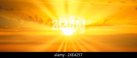 Sunset sky with sunset clouds and sun rays Stock Photo