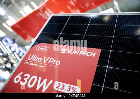 Munich, Germany. 20th June, 2024. The logo and lettering of Suntech Power can be seen on a module of the Chinese company at the Intersolar Europe trade fair, the world's leading trade fair for the solar industry, which is part of The smarter E Europe, at the exhibition center in Munich (Bavaria). The photovoltaic manufacturer Wuxi Suntech Power Co, Ltd is dedicated to the research and development as well as the production of crystalline silicon solar cells and modules and is part of Shunfeng International Clean Energy. Credit: Matthias Balk/dpa/Alamy Live News Stock Photo