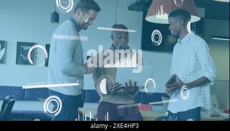 Image of multiple graphs, loading bars and circles, diverse coworkers sharing ideas in office Stock Photo