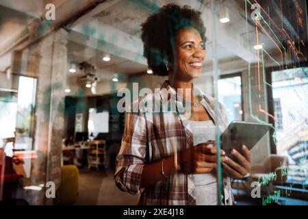 Software, coding and business woman on tablet thinking of data analytics, digital technology. Stock Photo