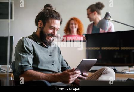 Software, coding and business woman on tablet thinking of data analytics, digital technology. Stock Photo