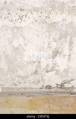 Grunge background texture of an old white plaster wall. Full frame Stock Photo