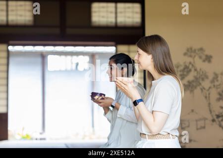 Foreigner receiving matcha tea Stock Photo