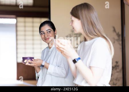 Foreigner receiving matcha tea Stock Photo