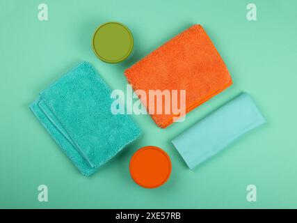 Microfiber clothes and household cleaning products Stock Photo