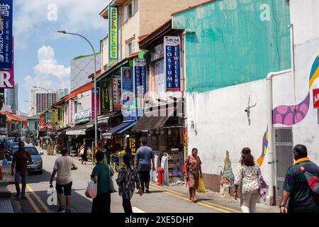 25 June 2024. Little India precinct. A group of Indians walking on the road. Singapore. Southeast Asia Stock Photo