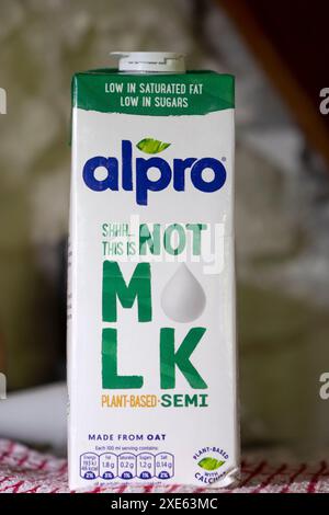 Alpro carton low-sugar low in saturated fat  long-life dairy free plant-based semi oat drink label 'This is Not Milk" in kitchen Great Britain UK 2024 Stock Photo