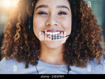 Woman, face and smile in call center with headset for customer service, crm and help or consulting. Agent portrait, headphones and communication with Stock Photo