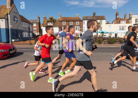 England, Kent, Deal, Group of Charity Runners Stock Photo