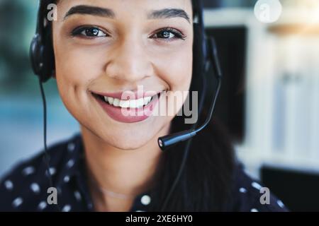 Agent, portrait and smile in call center with headset for customer service, crm and help or consulting. Woman, headphones and communication with Stock Photo