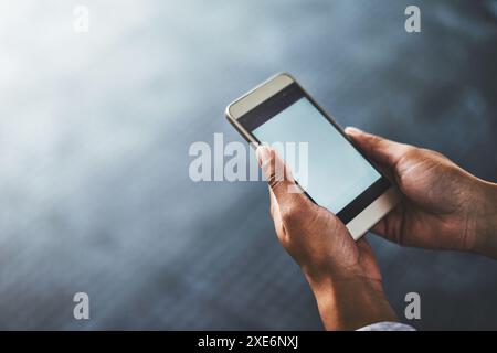 Phone screen, hands and mockup space on app for promotion, marketing and communication. Smartphone, display and closeup of person in top view on Stock Photo
