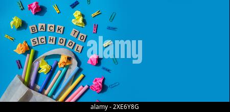 Banner copy space Educational greeting announcement for students and teacher. Saying BACK TO SCHOOL text on wooden blocks on cre Stock Photo