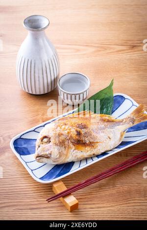 Grilled sea bream with sake Stock Photo