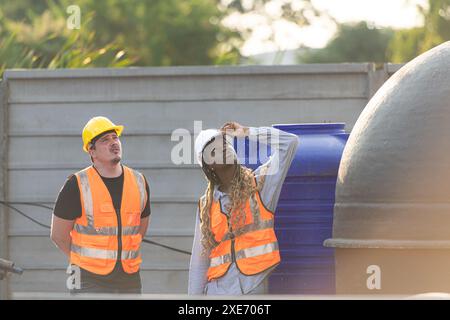 Architect and engineer with experience in multi-story building construction, Inspecting the water system in a construction build Stock Photo