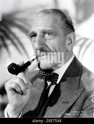 Sir C. AUBREY SMITH 1939 Portrait with Pipe publicity for REBECCA 1940 director ALFRED HITCHCOCK novel Daphne Du Maurier producer David O. Selznick Selznick International Pictures / United Artists Stock Photo