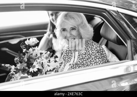 EDITORS NOTE Image has been converted to black and white. Queen Camilla, departs following her visit to Christ Church C of E Primary School in London, to celebrate their Literary Festival. Picture date: Wednesday June 26, 2024. Stock Photo