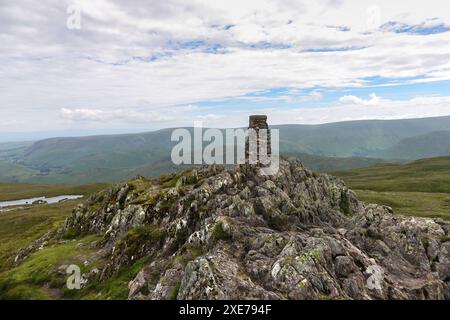 The summit trig point on Place Fell, Lake District, Cumbria, UK Stock Photo