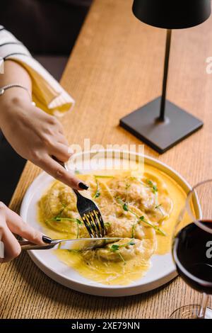 How to close the ravioli with the fork Stock Photo - Alamy